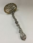 A rare cast Victorian silver pierced ladle with vi