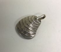 A novelty Victorian silver pendant in the form of