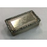 A large William IV silver snuff box with chased de