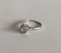 A large diamond single stone mounted as a ring in