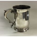 AN early George III silver pint mug. London 1762.