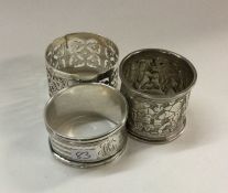 A group of three good silver napkin rings. Various