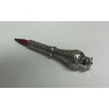 A heavy Continental silver extending pencil with c