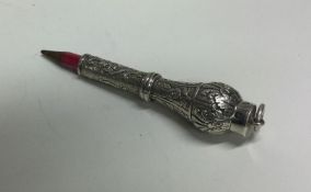 A heavy Continental silver extending pencil with c