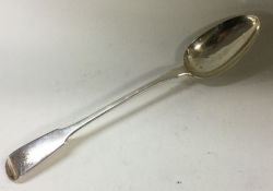 A heavy George III silver basting spoon. London 18