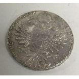 A German silver coin dated 1780. Approx. 24 grams.