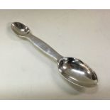 A silver measuring spoon. London 1930. Approx. 31