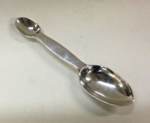 A silver measuring spoon. London 1930. Approx. 31