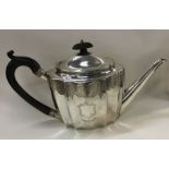 A Georgian bright cut silver teapot. London 1795.