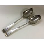 A good pair of engraved silver serving spoons. Lon