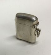 A heavy shaped silver vesta case with hinged top.
