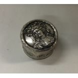 A decorative chased silver hinged top box. Approx.