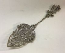 A good quality preserve spoon decorated with a tav