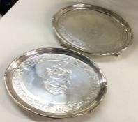 A fine pair of engraved George III oval silver sal