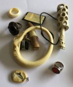 WITHDRAWN: A group of silver mounted rings, ivory bangles etc. Est.