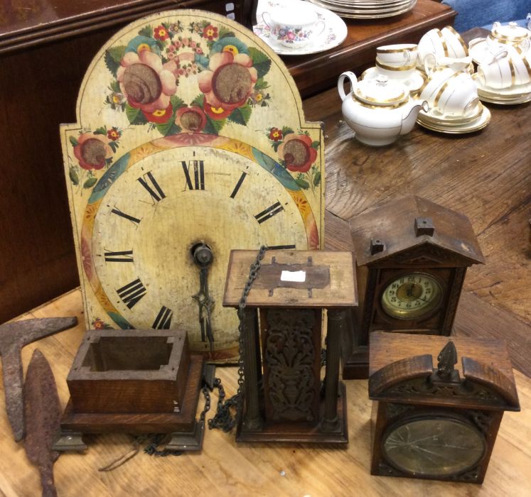 A group of old clocks etc.