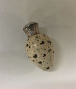 An unusual Victorian silver mounted scent bottle w