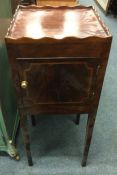 An Antique single door cabinet.