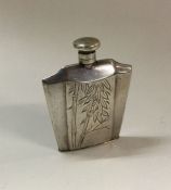 A stylish Japanese engraved silver scent bottle. M
