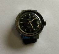 TIDEMASTER: An unusual stainless steel wristwatch
