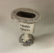 A Judaica silver Havdalah Shabbat candle holder.