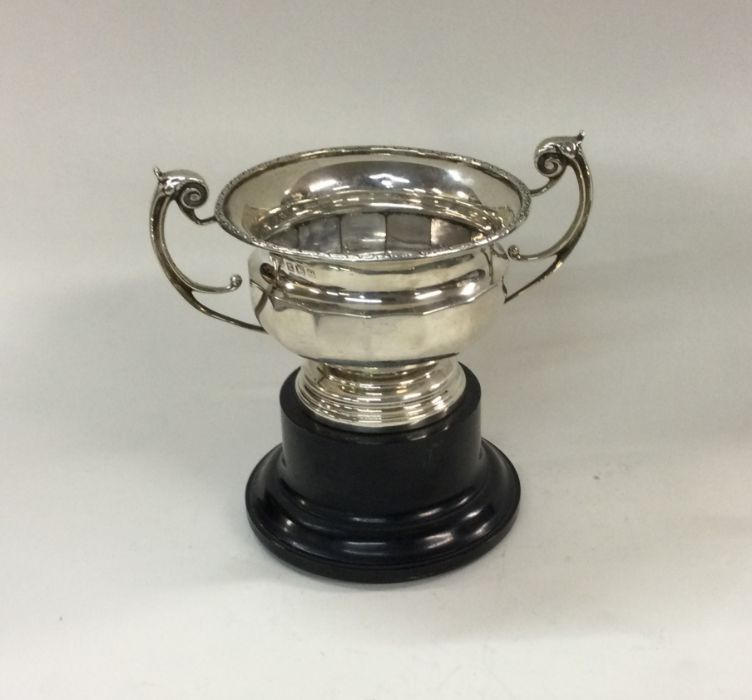 A silver two handled cup on plinth base. Birmingha - Image 2 of 2