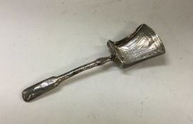 A George III bright cut silver caddy spoon. Approx