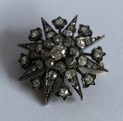 A good Victorian gold mounted diamond brooch in th