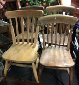 Four old kitchen chairs.
