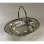 A good George III pierced silver basket engraved w