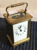 An old brass carriage clock with striking movement