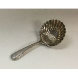 A George III silver caddy spoon. London 1807. By W