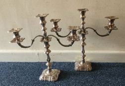 A heavy pair of silver candelabra. London 1962. By