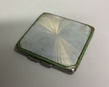 A silver and enamelled compact. Birmingham. By A B