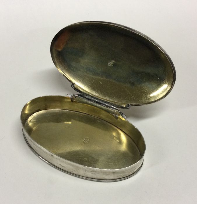 A Georgian silver oval box with hinged cover. Punc - Image 2 of 2