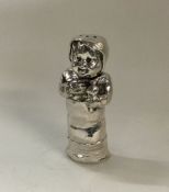 An unusual novelty silver pepper in the form of a
