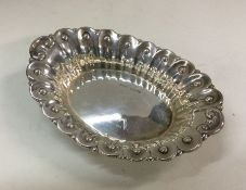 A silver dish with beaded border. Sheffield. By Ja