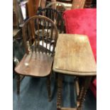 Three stick back chairs together with a drop leaf