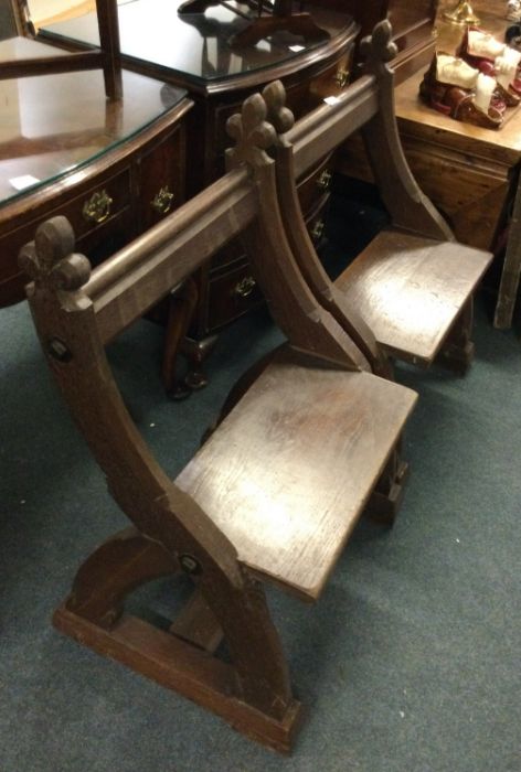 A pair of altar chairs.