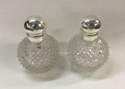 A fine pair of Victorian silver mounted glass scen