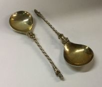 A heavy pair of Victorian silver gilt figural spoo