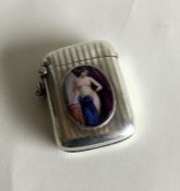 An attractive silver vesta case with oval porcelai