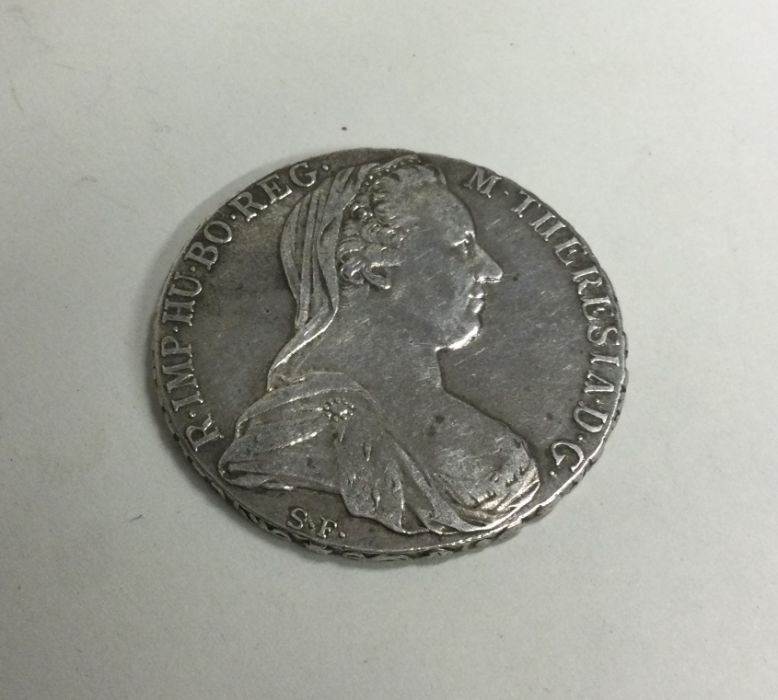 A German silver coin dated 1780. Approx. 24 grams.