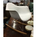 An art deco style rocking chair.