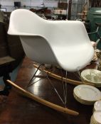 An art deco style rocking chair.