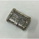 An unusual George III silver vinaigrette in the fo