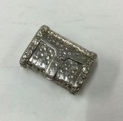 An unusual George III silver vinaigrette in the fo