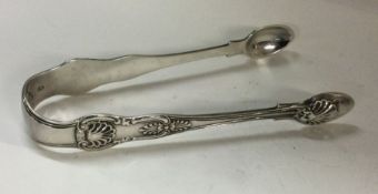 A fine pair of Kings' pattern silver sugar tongs.