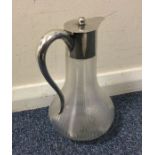 An Austrian silver lemonade jug with hinged top an