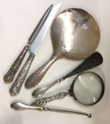 A group of silver mounted knives, magnifiers etc.